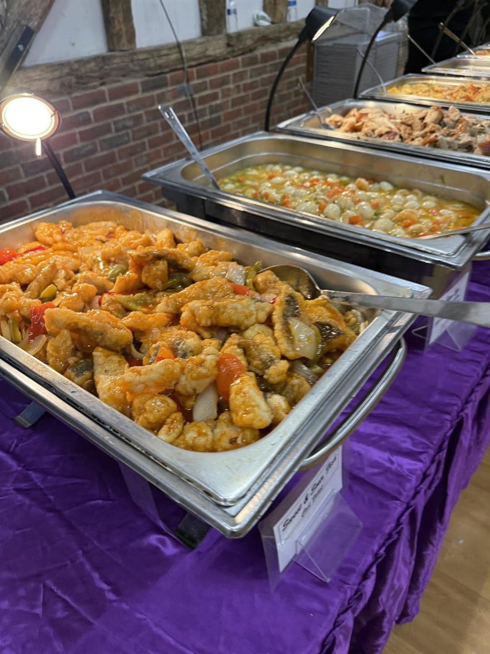 A Lola Maria catering buffet at an event